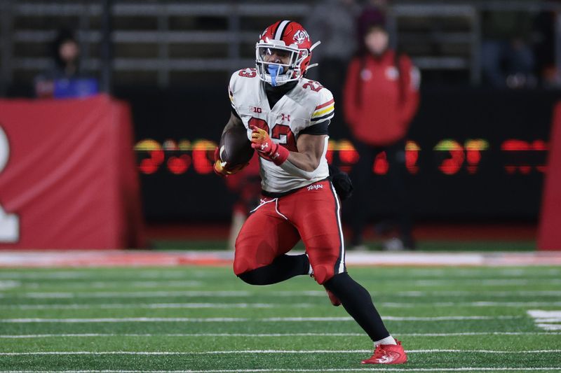 Nov 25, 2023; Piscataway, New Jersey, USA; Maryland Terrapins running back Colby McDonald (23) carries the ball during the second half against the Rutgers Scarlet Knights at SHI Stadium. Mandatory Credit: Vincent Carchietta-USA TODAY Sports