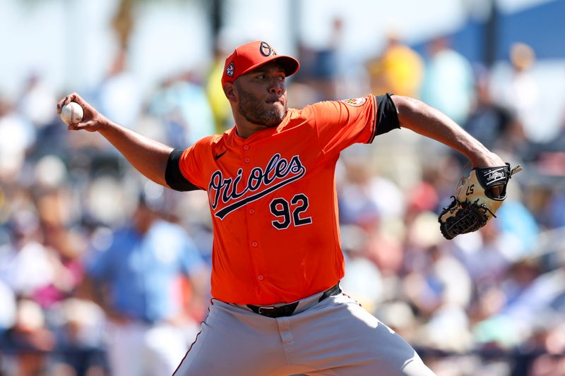 Mar 15, 2024; Port Charlotte, Florida, USA;  Baltimore Orioles pitcher Albert Suarez (92) throws a pitch against the Tampa Bay Rays in the sixth inning at Charlotte Sports Park. Mandatory Credit: Nathan Ray Seebeck-USA TODAY Sports