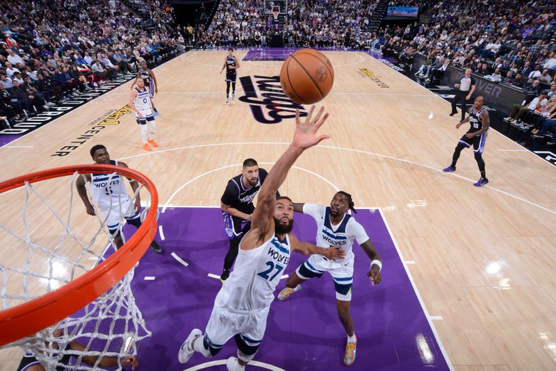 SACRAMENTO, CA - OCTOBER 24: Rudy Gobert #27 of the Minnesota Timberwolves rebounds the ball during the game against the Sacramento Kings on October 24, 2024 at Golden 1 Center in Sacramento, California. NOTE TO USER: User expressly acknowledges and agrees that, by downloading and or using this Photograph, user is consenting to the terms and conditions of the Getty Images License Agreement. Mandatory Copyright Notice: Copyright 2024 NBAE (Photo by Rocky Widner/NBAE via Getty Images)