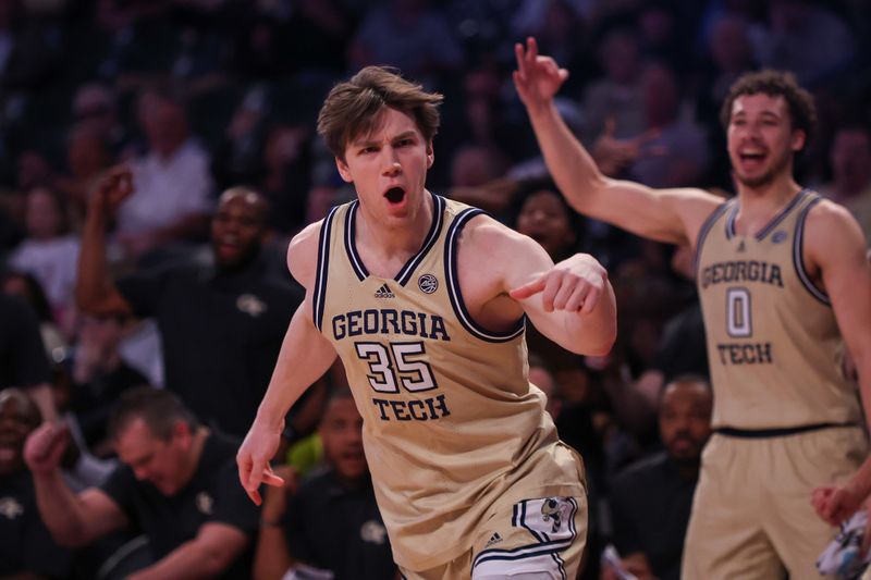 Mar 1, 2025; Atlanta, Georgia, USA; Georgia Tech Yellow Jackets forward Emmer Nichols (35) reacts after a three-pointer against the North Carolina State Wolfpack in the second half at McCamish Pavilion. Mandatory Credit: Brett Davis-Imagn Images