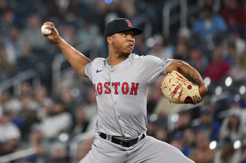 Sep 24, 2024; Toronto, Ontario, CAN; Boston Red Sox starting pitcher Brayan Bello (66) pitches against the Toronto Blue Jays in the first inning at Rogers Centre. Mandatory Credit: Dan Hamilton-Imagn Images