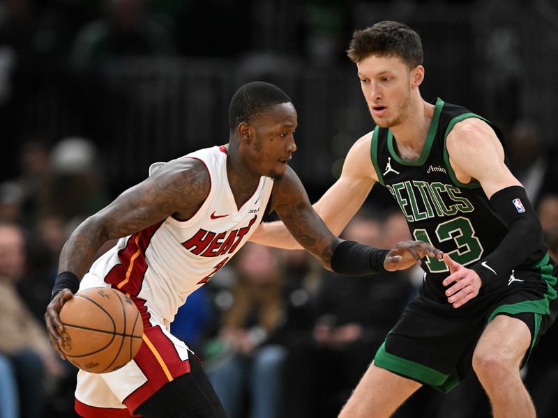 BOSTON, MASSACHUSETTS - DECEMBER 02: Terry Rozier #2 of the Miami Heat goes to the basket against Drew Peterson #13 of the Boston Celtics during the fourth quarter at the TD Garden on December 02, 2024 in Boston, Massachusetts. NOTE TO USER: User expressly acknowledges and agrees that, by downloading and or using this photograph, User is consenting to the terms and conditions of the Getty Images License Agreement. (Photo by Brian Fluharty/Getty Images)