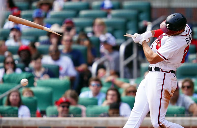 Sep 10, 2023; Cumberland, Georgia, USA; Atlanta Braves first baseman Matt Olson (28) breaks his bat against the Pittsburgh Pirates during the sixth inning at Truist Park. Mandatory Credit: John David Mercer-USA TODAY Sports