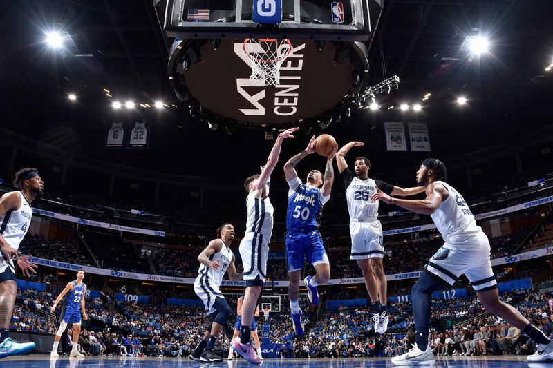 ORLANDO, FL - MARCH 30: Cole Anthony #50 of the Orlando Magic drives to the basket during the game against the Memphis Grizzlies on March 30, 2024 at the Kia Center in Orlando, Florida. NOTE TO USER: User expressly acknowledges and agrees that, by downloading and or using this photograph, User is consenting to the terms and conditions of the Getty Images License Agreement. Mandatory Copyright Notice: Copyright 2024 NBAE (Photo by Fernando Medina/NBAE via Getty Images)