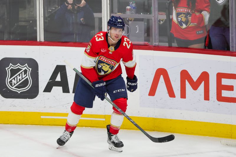 Nov 6, 2023; Sunrise, Florida, USA; Florida Panthers center Carter Verhaeghe (23) looks on after scoring the game-winning goal against the Columbus Blue Jackets at Amerant Bank Arena. Mandatory Credit: Sam Navarro-USA TODAY Sports