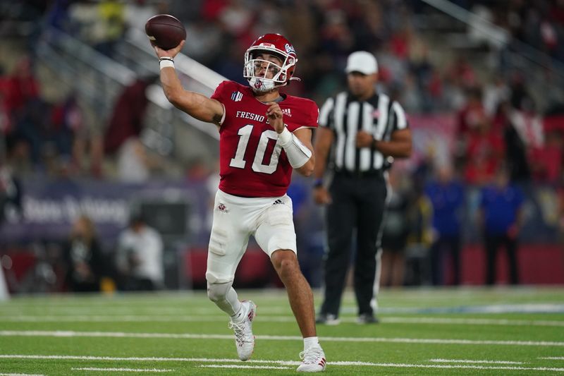 Oct 15, 2022; Fresno, California, USA; Fresno State Bulldogs quarterback Logan Fife (10) throws a pass against the San Jose State Spartans in the third quarter at Valley Children's Stadium. Mandatory Credit: Cary Edmondson-USA TODAY Sports