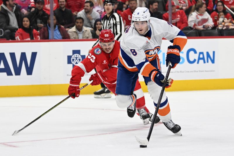 Nov 21, 2024; Detroit, Michigan, USA;  New York Islanders defenseman Noah Dobson (8) skates past Detroit Red Wings right wing Alex DeBrincat (93) in the first period at Little Caesars Arena. Mandatory Credit: Lon Horwedel-Imagn Images