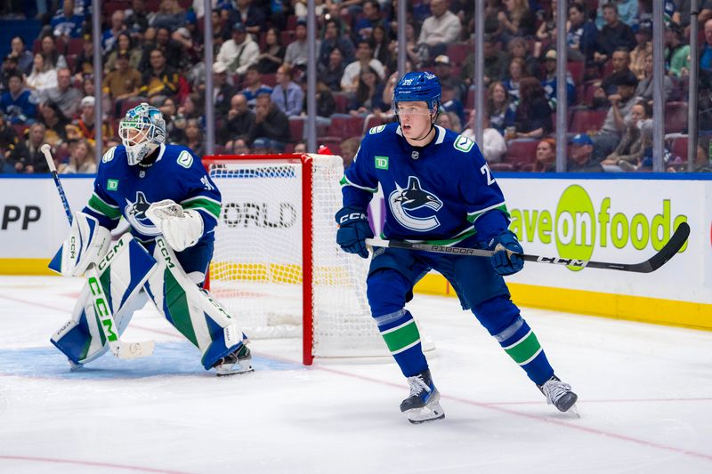 Sep 24, 2024; Vancouver, British Columbia, CAN;  Vancouver Canucks defenseman Elias Pettersson (26) skates against the Seattle Kraken during the second period at Rogers Arena. Mandatory Credit: Bob Frid-Imagn Images