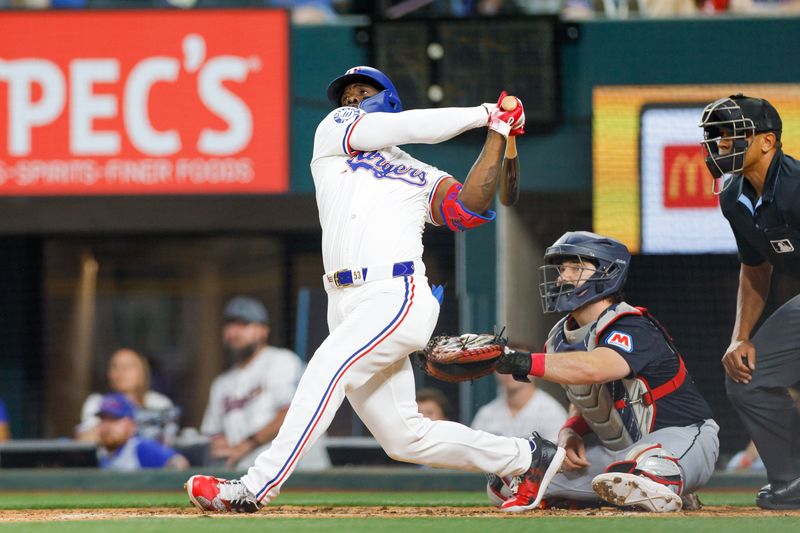 May 15, 2024; Arlington, Texas, USA; Texas Rangers outfielder Adolis García (53) hits a two-run home run during the sixth inning against the Cleveland Guardians at Globe Life Field. Mandatory Credit: Andrew Dieb-USA TODAY Sports