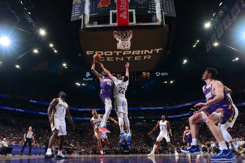 PHOENIX, AZ - APRIL 7: Kevin Durant #35 of the Phoenix Suns drives to the basket during the game against the New Orleans Pelicans on April 7, 2024 at Footprint Center in Phoenix, Arizona. NOTE TO USER: User expressly acknowledges and agrees that, by downloading and or using this photograph, user is consenting to the terms and conditions of the Getty Images License Agreement. Mandatory Copyright Notice: Copyright 2024 NBAE (Photo by Kate Frese/NBAE via Getty Images)