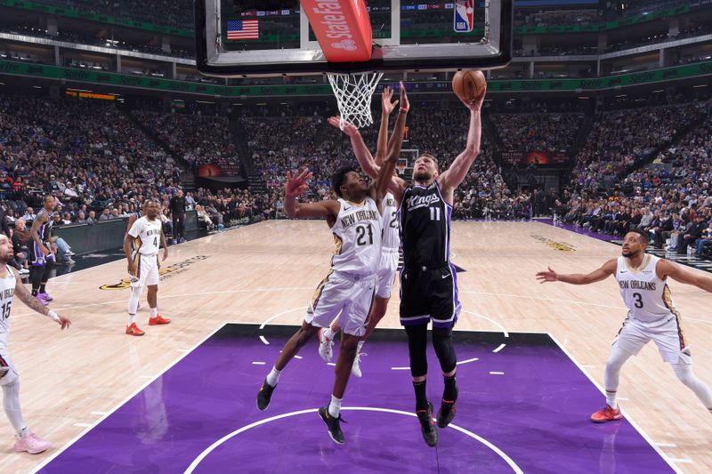 SACRAMENTO, CA - FEBRUARY 8:Domantas Sabonis #11 of the Sacramento Kings drives to the basket during the game against the New Orleans Pelicans on February 8, 2025 at Golden 1 Center in Sacramento, California. NOTE TO USER: User expressly acknowledges and agrees that, by downloading and or using this Photograph, user is consenting to the terms and conditions of the Getty Images License Agreement. Mandatory Copyright Notice: Copyright 2025 NBAE (Photo by Rocky Widner/NBAE via Getty Images)