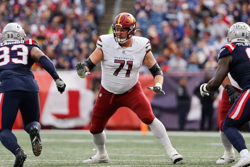 Washington Commanders guard Andrew Wylie blocks during an NFL football game against the New England Patriots at Gillette Stadium, Sunday Nov. 5, 2023 in Foxborough, Mass. (Winslow Townson/AP Images for Panini)