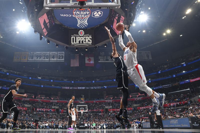 LOS ANGELES, CA - JANUARY 21: Russell Westbrook #0 of the LA Clippers drives to the basket during the game against the Brooklyn Nets on January 21, 2024 at Crypto.Com Arena in Los Angeles, California. NOTE TO USER: User expressly acknowledges and agrees that, by downloading and/or using this Photograph, user is consenting to the terms and conditions of the Getty Images License Agreement. Mandatory Copyright Notice: Copyright 2024 NBAE (Photo by Adam Pantozzi/NBAE via Getty Images)