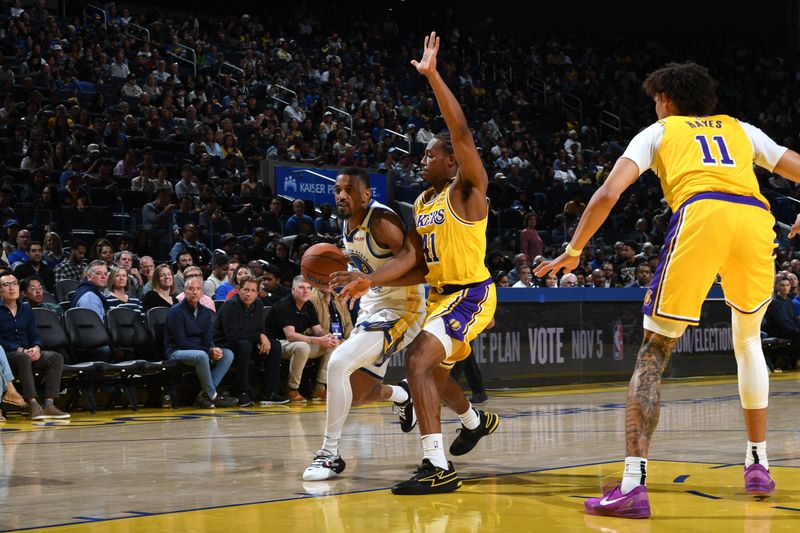 SAN FRANCISCO, CA - OCTOBER 18: De'Anthony Melton #8 of the Golden State Warriors handles the ball during the game against the Los Angeles Lakers during a NBA Preseason game on October 18, 2024 at Chase Center in San Francisco, California. NOTE TO USER: User expressly acknowledges and agrees that, by downloading and or using this photograph, user is consenting to the terms and conditions of Getty Images License Agreement. Mandatory Copyright Notice: Copyright 2024 NBAE (Photo by Noah Graham/NBAE via Getty Images)