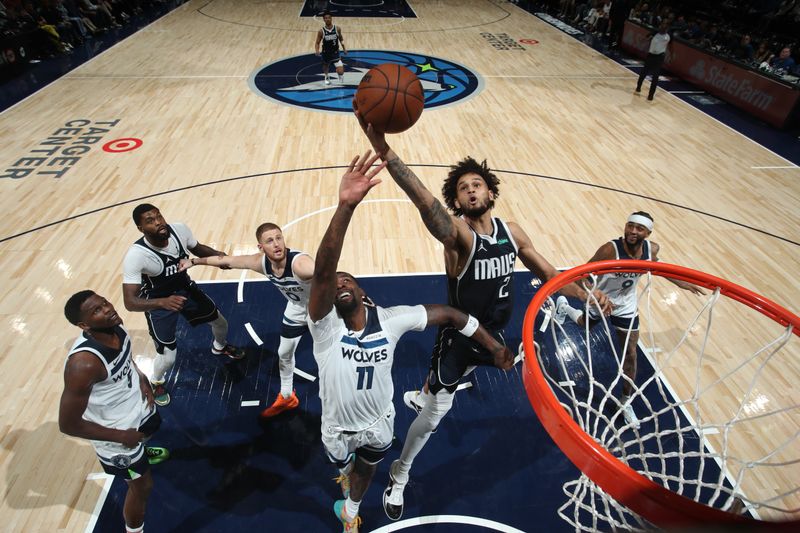 MINNEAPOLIS, MN -  OCTOBER 29: Dereck Lively II #2 of the Dallas Mavericks drives to the basket during the game against the Minnesota Timberwolves on October 29, 2024 at Target Center in Minneapolis, Minnesota. NOTE TO USER: User expressly acknowledges and agrees that, by downloading and or using this Photograph, user is consenting to the terms and conditions of the Getty Images License Agreement. Mandatory Copyright Notice: Copyright 2024 NBAE (Photo by Jordan Johnson/NBAE via Getty Images)