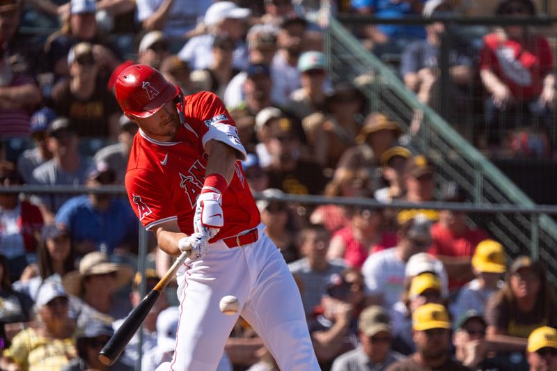 Mar 10, 2024; Tempe, Arizona, USA; Los Angeles Angels outfielder Mike Trout (27) hits a triple in the sixth during a spring training game against the San Diego Padres at Tempe Diablo Stadium. Mandatory Credit: Allan Henry-USA TODAY Sports
