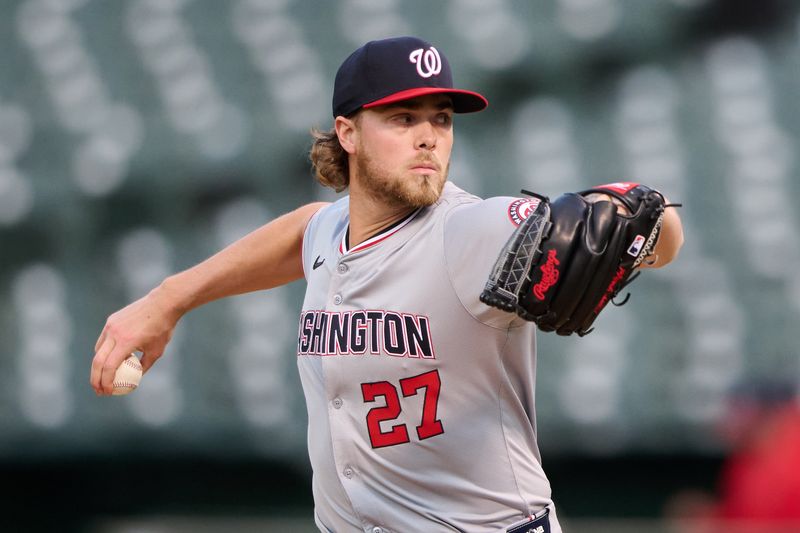 Apr 12, 2024; Oakland, California, USA; Washington Nationals starting pitcher Jake Irvin (27) throws a pitch against the Oakland Athletics during the first inning at Oakland-Alameda County Coliseum. Mandatory Credit: Robert Edwards-USA TODAY Sports