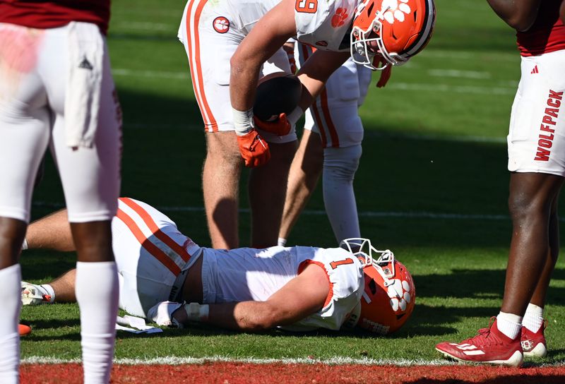 Oct 28, 2023; Raleigh, North Carolina, USA; Clemson Tigers running back Will Shipley (1) is injured during the first half against the North Carolina State Wolfpack at Carter-Finley Stadium. Mandatory Credit: Rob Kinnan-USA TODAY Sports