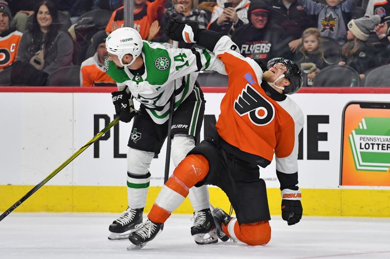 Jan 18, 2024; Philadelphia, Pennsylvania, USA; Dallas Stars left wing Jamie Benn (14) and Philadelphia Flyers defenseman Travis Sanheim (6) battle during the second period at Wells Fargo Center. Mandatory Credit: Eric Hartline-USA TODAY Sports