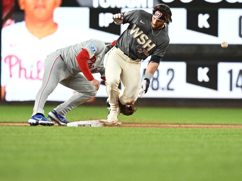 Sep 27, 2024; Washington, District of Columbia, USA;  Washington Nationals outfielder Dylan Crews (3) doubles against the Philadelphia Phillies during the first inning at Nationals Park. Mandatory Credit: James A. Pittman-Imagn Images