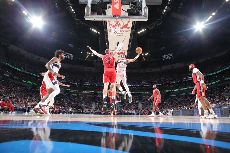 NEW ORLEANS, LA - FEBRUARY 14: Jordan Poole #13 of the Washington Wizards drives to the basket during the game against the New Orleans Pelicans on February 14, 2024 at the Smoothie King Center in New Orleans, Louisiana. NOTE TO USER: User expressly acknowledges and agrees that, by downloading and or using this Photograph, user is consenting to the terms and conditions of the Getty Images License Agreement. Mandatory Copyright Notice: Copyright 2024 NBAE (Photo by Layne Murdoch Jr./NBAE via Getty Images)