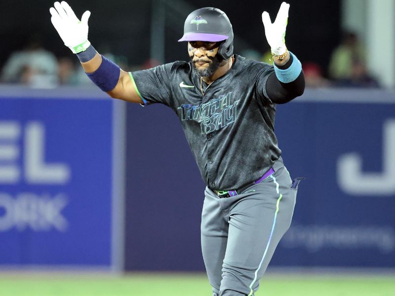 Sep 19, 2025; Tampa, Florida, USA;  Tampa Bay Rays designated hitter Yandy Diaz (2) doubles during the first inning against the Boston Red Sox at George M. Steinbrenner Field. Mandatory Credit: Kim Klement Neitzel-Imagn Images