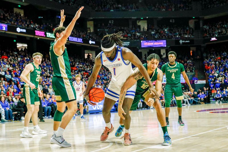 Jan 9, 2024; Boise, Idaho, USA; Boise State Broncos forward O'Mar Stanley (1) attempts to control the ball during the second half against the Colorado State Rams at ExtraMile Arena. Mandatory Credit: Brian Losness-USA TODAY Sports