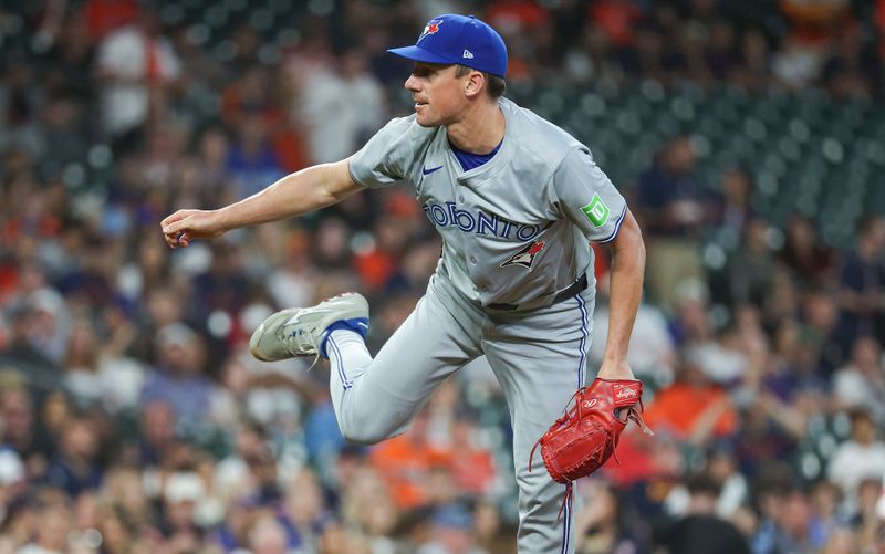 Apr 3, 2024; Houston, Texas, USA; Toronto Blue Jays starting pitcher Chris Bassitt (40) delivers a pitch during the first inning against the Houston Astros at Minute Maid Park. Mandatory Credit: Troy Taormina-USA TODAY Sports