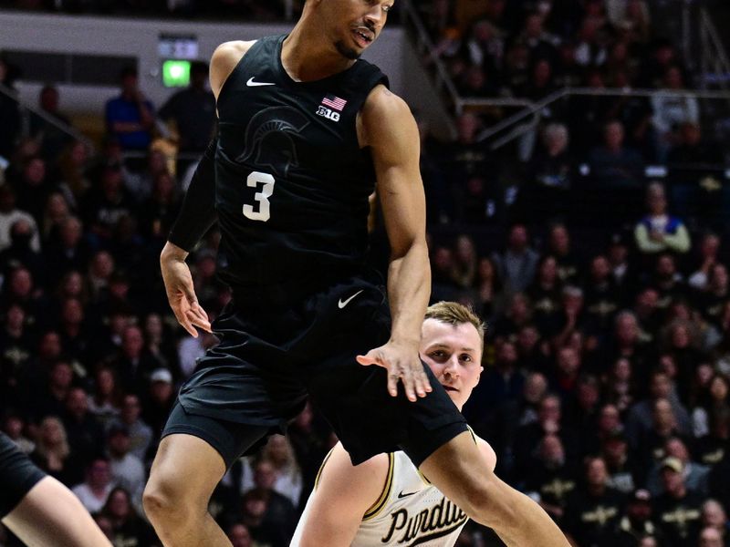 Mar 2, 2024; West Lafayette, Indiana, USA; Purdue Boilermakers guard Fletcher Loyer (2) fakes out Michigan State Spartans guard Jaden Akins (3) during the second half at Mackey Arena. Mandatory Credit: Marc Lebryk-USA TODAY Sports