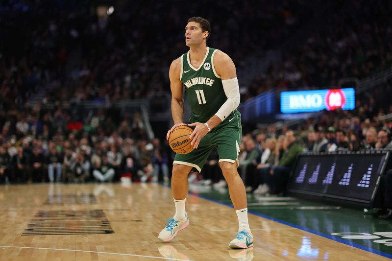 MILWAUKEE, WISCONSIN - NOVEMBER 26: Brook Lopez #11 of the Milwaukee Bucks takes a three point shot during a game against the Portland Trail Blazers at Fiserv Forum on November 26, 2023 in Milwaukee, Wisconsin. NOTE TO USER: User expressly acknowledges and agrees that, by downloading and or using this photograph, User is consenting to the terms and conditions of the Getty Images License Agreement. (Photo by Stacy Revere/Getty Images)