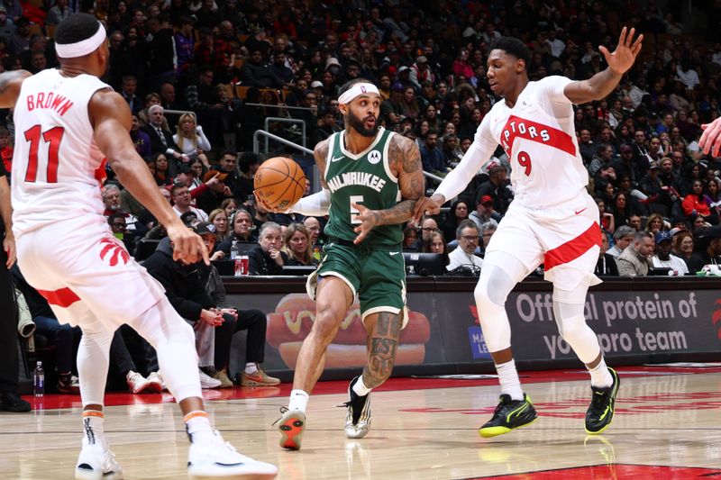 TORONTO, CANADA - JANUARY 6: Gary Trent Jr. #5 of the Milwaukee Bucks looks to pass the ball during the game against the Toronto Raptors on January 6, 2025 at the Scotiabank Arena in Toronto, Ontario, Canada.  NOTE TO USER: User expressly acknowledges and agrees that, by downloading and or using this Photograph, user is consenting to the terms and conditions of the Getty Images License Agreement.  Mandatory Copyright Notice: Copyright 2025 NBAE (Photo by Vaughn Ridley/NBAE via Getty Images)