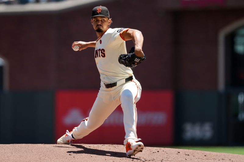 Jun 27, 2024; San Francisco, California, USA; San Francisco Giants starting pitcher Jordan Hicks (12) throws a pitch against the Chicago Cubs during the first inning at Oracle Park. Mandatory Credit: Darren Yamashita-USA TODAY Sports