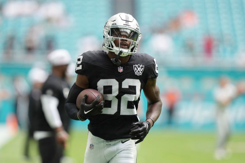 Las Vegas Raiders wide receiver Ramel Keyton (82) warms up before an NFL football game against the Miami Dolphins, Sunday, Nov. 17, 2024, in Miami Gardens, Fla. (AP Photo/Lynne Sladky)