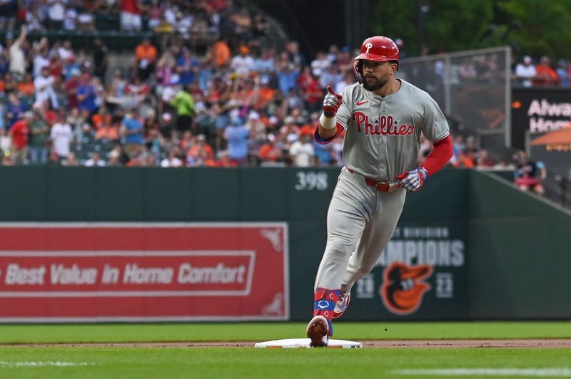 Jun 14, 2024; Baltimore, Maryland, USA;  Philadelphia Phillies designated hitter Kyle Schwarber (12) point to teammates after hitting a solo home run in in the first inning against the Baltimore Orioles at Oriole Park at Camden Yards. Mandatory Credit: Tommy Gilligan-USA TODAY Sports