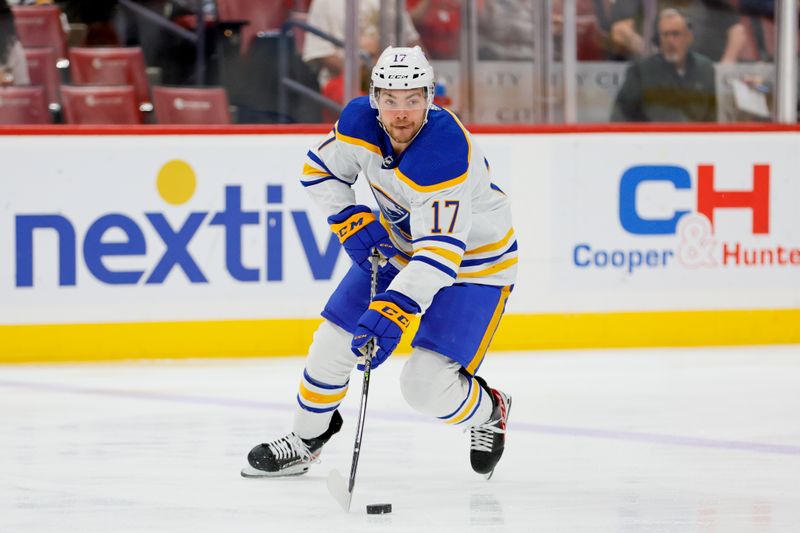 Apr 4, 2023; Sunrise, Florida, USA; Buffalo Sabres center Tyson Jost (17) moves the puck during the first period against the Florida Panthers at FLA Live Arena. Mandatory Credit: Sam Navarro-USA TODAY Sports