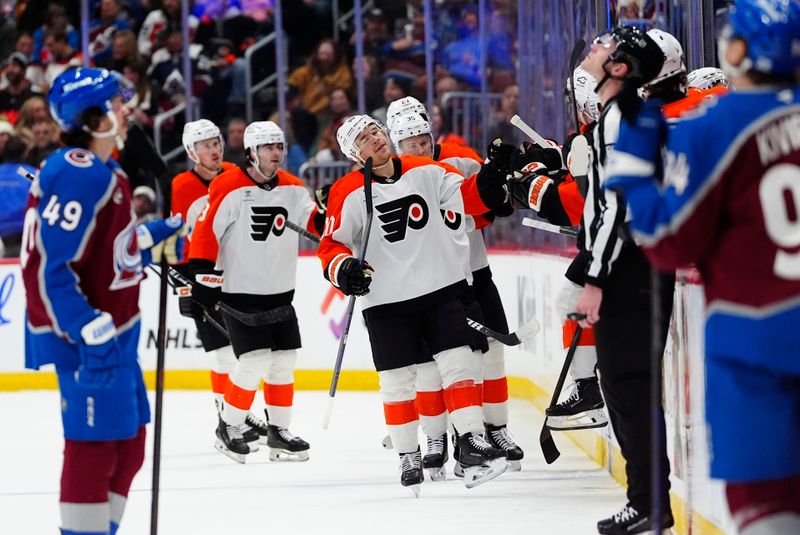 Jan 23, 2026; Denver, Colorado, USA; Philadelphia Flyers right wing Bobby Brink (10) celebrates his goal in the second period against the Colorado Avalanche at Ball Arena. Mandatory Credit: Ron Chenoy-Imagn Images