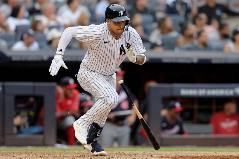 Aug 24, 2023; Bronx, New York, USA; New York Yankees left fielder Everson Pereira (80) runs up the first base line after hitting a double against the Washington Nationals during the eighth inning at Yankee Stadium. The hit was his first of his major league career. Mandatory Credit: Brad Penner-USA TODAY Sports