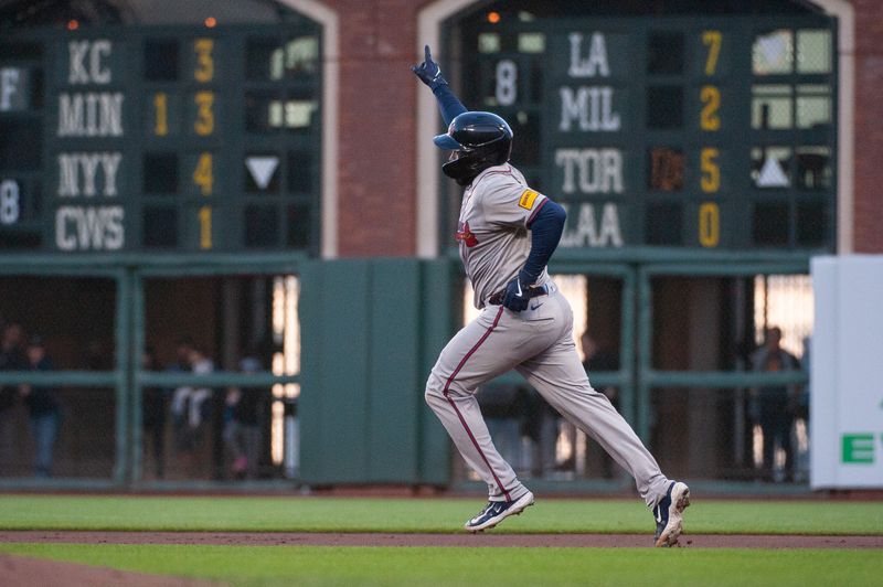 Aug 13, 2024; San Francisco, California, USA;  Atlanta Braves catcher Travis d'Arnaud (16) rounds the bases after hitting a home run against the San Francisco Giants during the third inning at Oracle Park. Mandatory Credit: Ed Szczepanski-USA TODAY Sports