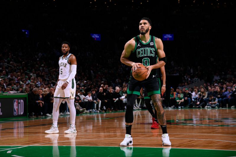 BOSTON, MA - MARCH 20:  Jayson Tatum #0 of the Boston Celtics shoots a free throw during the game against the Milwaukee Bucks on March 20, 2024 at the TD Garden in Boston, Massachusetts. NOTE TO USER: User expressly acknowledges and agrees that, by downloading and or using this photograph, User is consenting to the terms and conditions of the Getty Images License Agreement. Mandatory Copyright Notice: Copyright 2024 NBAE  (Photo by Brian Babineau/NBAE via Getty Images)