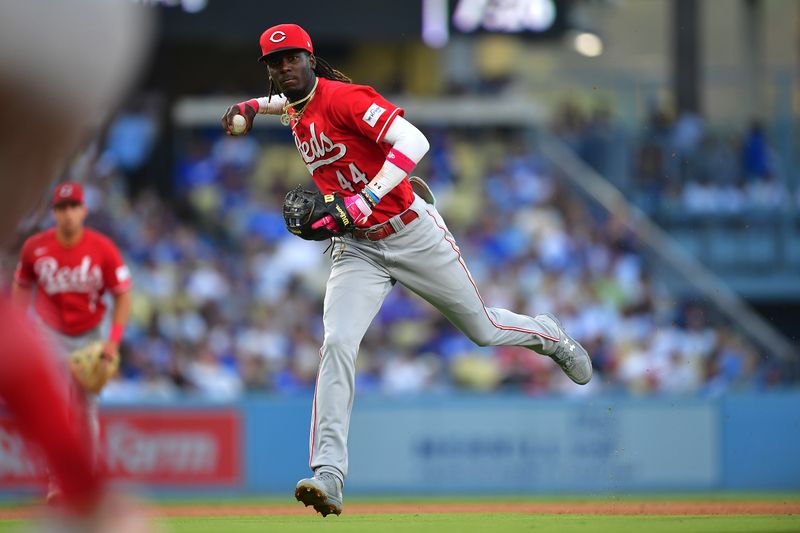 Jul 29, 2023; Los Angeles, California, USA; Cincinnati Reds shortstop Elly De La Cruz (44) throws to first for the out against Los Angeles Dodgers left fielder David Peralta (6) during the fifth inning at Dodger Stadium. Mandatory Credit: Gary A. Vasquez-USA TODAY Sports