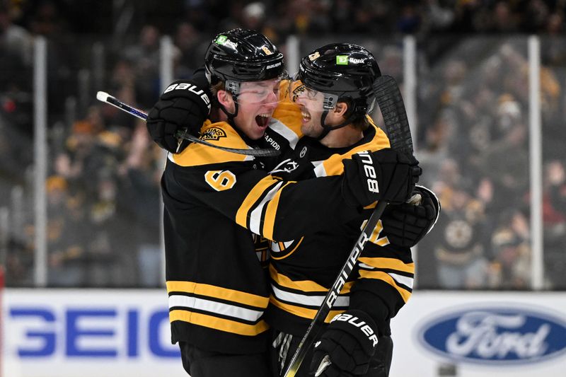 Jan 14, 2025; Boston, Massachusetts, USA; Boston Bruins defenseman Parker Wotherspoon (29) celebrates with defenseman Mason Lohrei (6) after scoring a goal against the Tampa Bay Lightning during the first period at the TD Garden. Mandatory Credit: Brian Fluharty-Imagn Images