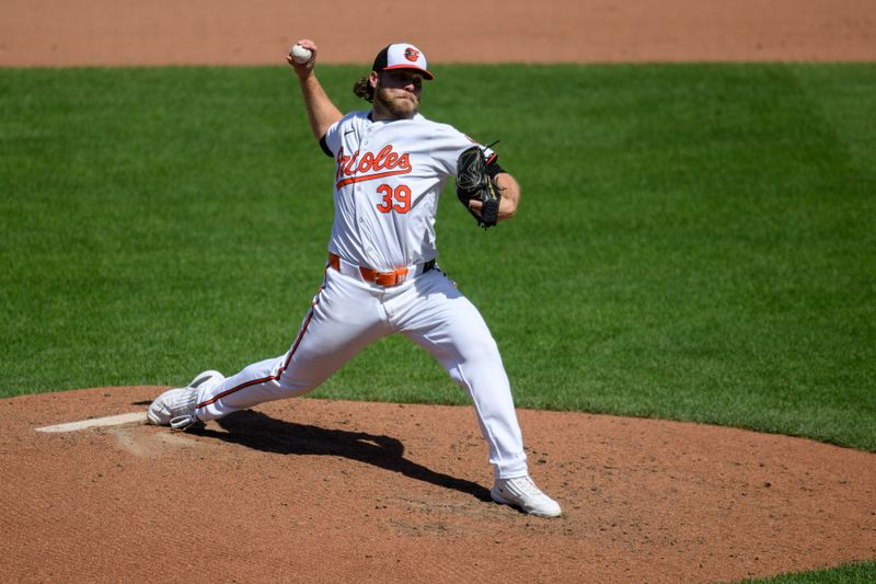 Apr 14, 2024; Baltimore, Maryland, USA; Baltimore Orioles pitcher Corbin Burnes (39) throws a pitch during the fourth inning against the Milwaukee Brewers at Oriole Park at Camden Yards. Mandatory Credit: Reggie Hildred-USA TODAY Sports