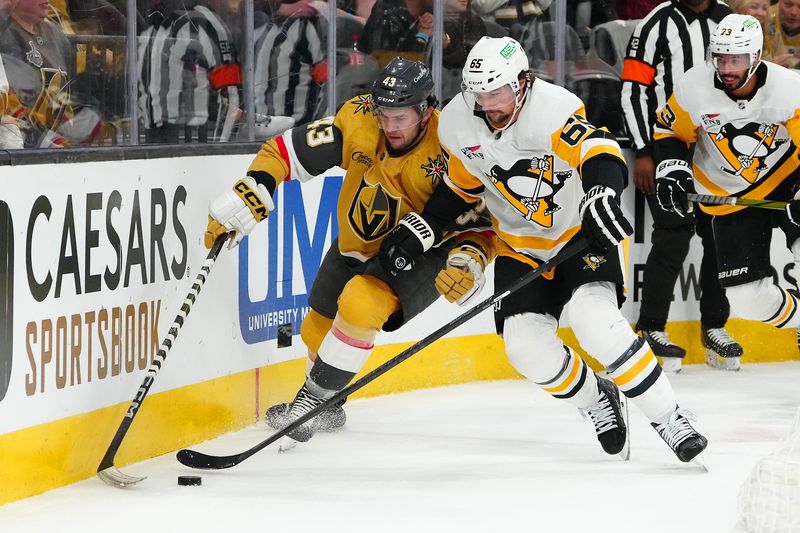 Jan 20, 2024; Las Vegas, Nevada, USA; Pittsburgh Penguins defenseman Erik Karlsson (65) steals the puck from Vegas Golden Knights center Paul Cotter (43) during the first period at T-Mobile Arena. Mandatory Credit: Stephen R. Sylvanie-USA TODAY Sports