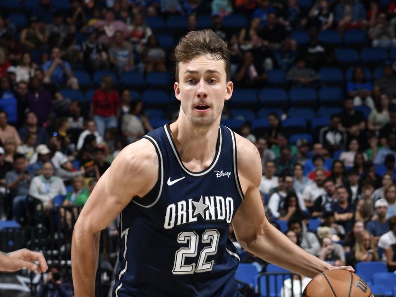 ORLANDO, FL - MARCH 17: Franz Wagner #22 of the Orlando Magic dribbles the ball during the game against the Toronto Raptors on March 17, 2024 at the Kia Center in Orlando, Florida. NOTE TO USER: User expressly acknowledges and agrees that, by downloading and or using this photograph, User is consenting to the terms and conditions of the Getty Images License Agreement. Mandatory Copyright Notice: Copyright 2024 NBAE (Photo by Fernando Medina/NBAE via Getty Images)