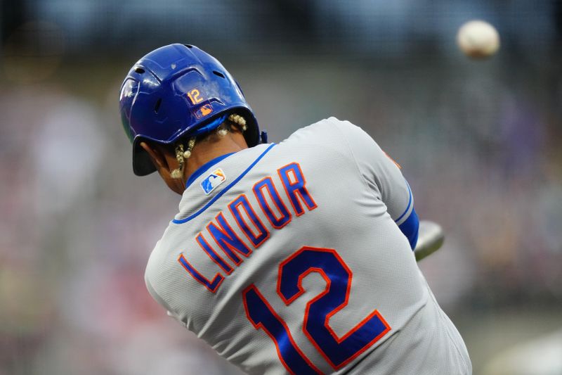 May 27, 2023; Denver, Colorado, USA; New York Mets shortstop Francisco Lindor (12) flies out against the Colorado Rockies in the first inning at Coors Field. Mandatory Credit: Ron Chenoy-USA TODAY Sports
