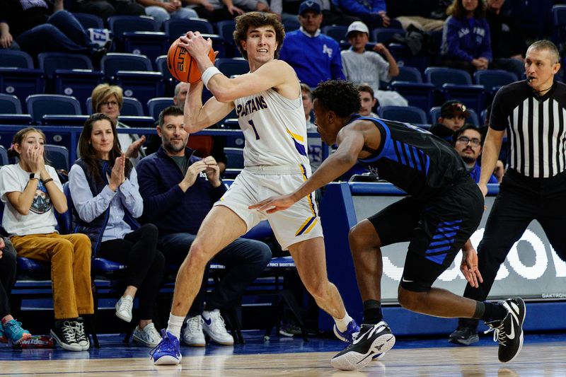 Jan 13, 2024; Colorado Springs, Colorado, USA; San Jose State Spartans guard Garrett Anderson (1) controls the ball as Air Force Falcons guard Ethan Taylor (5) defends in the second half at Clune Arena. Mandatory Credit: Isaiah J. Downing-USA TODAY Sports