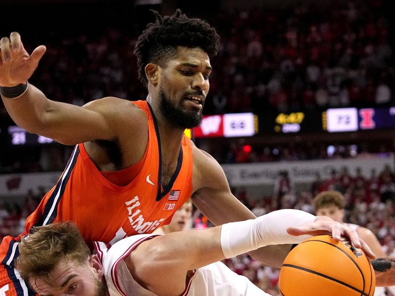 Mar 2, 2024; Madison, WI, USA;  Illinois forward Quincy Guerrier (13) fouls Wisconsin forward Tyler Wahl (5) during the second half of their game Saturday, March 2, 2024 at the Kohl Center in Madison, Wisconsin.  Mandatory Credit: Mark Hoffman-USA TODAY Sports
