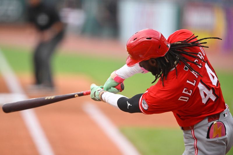 Jun 10, 2025; Cleveland, Ohio, USA; Cincinnati Reds shortstop Elly De La Cruz (44) singles in the fourth inning against the Cleveland Guardians at Progressive Field. Mandatory Credit: David Richard-Imagn Images