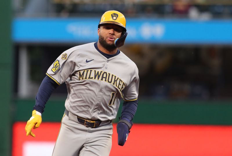 May 23, 2025; Pittsburgh, Pennsylvania, USA;  Milwaukee Brewers center fielder Jackson Chourio (11) runs from first base to third base against the Pittsburgh Pirates during the sixth inning at PNC Park. Mandatory Credit: Charles LeClaire-Imagn Images