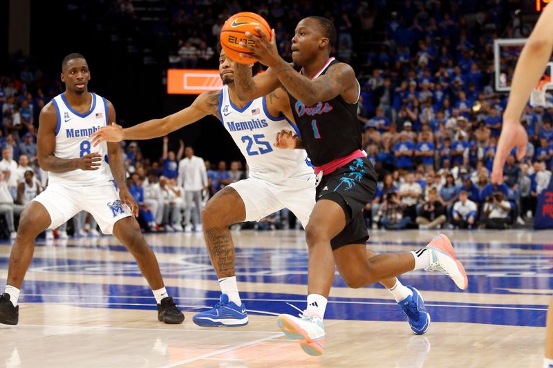 Feb 25, 2024; Memphis, Tennessee, USA; Florida Atlantic Owls guard Johnell Davis (1) drives to the basket as Memphis Tigers guard Jayden Hardaway (25) defends during the second half at FedExForum. Mandatory Credit: Petre Thomas-USA TODAY Sports